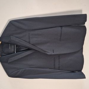 Tuxedo jacket with slight tear inside pocket